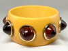 BB338 goldenrod bakelite bangle with rootbeer bullet dots